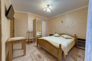 Letto o letti in una camera di Villa Anet