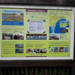 a sign for the les salilles interpretive trail at Bungalow a Hyeres prévoir serviettes de toilette et linge de lits in Hyères