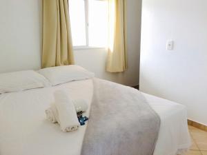 Een bed of bedden in een kamer bij Moradas da Bibi