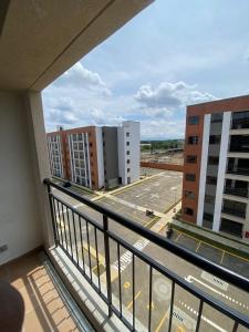 a balcony with a view of a parking lot at casa trieste in Jamundí +3 photos