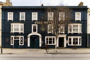 a black building with the bull hotel written on it at The Bull Hotel in Bridport