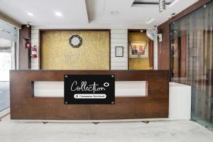 a sign on the front of a store at Collection O MP Nagar in Bhopal