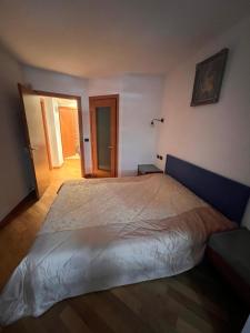 a bedroom with a large bed in a room at Luca Residence in Timişoara