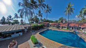an overhead view of a swimming pool at a resort at M Beach Resort in Colva