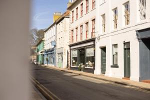 a view of an empty city street with buildings at The Library at The Merchants in Fenwick