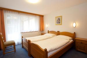 Postel nebo postele na pokoji v ubytování Bolero Appartements