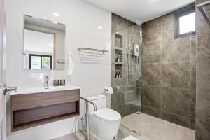 a bathroom with a toilet and a shower at Tiva Residence Bangkok in Bangkok +44 photos