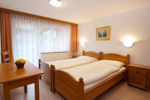 Postel nebo postele na pokoji v ubytování Bolero Appartements