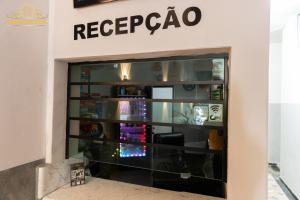 a store front of a rec room with a sign at Dom Victor Residence Hotel in Goiânia