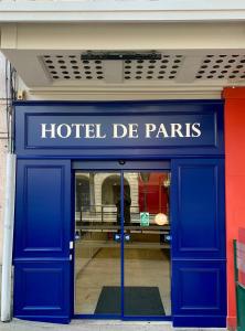 a hotel de paris sign over the door of a store at Hôtel de Paris - Dijon Centre Gare in Dijon