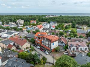 an aerial view of a small town with houses at Villa Cannes Jastarnia in Jastarnia