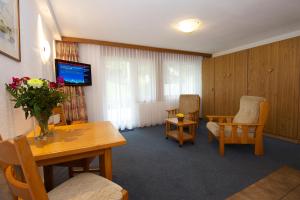 TV a/nebo společenská místnost v ubytování Bolero Appartements