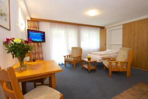 TV a/nebo společenská místnost v ubytování Bolero Appartements