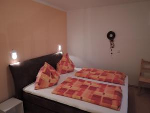 Postel nebo postele na pokoji v ubytování Haus Pfeiffenberger