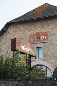 a sign on the side of a building at La Chaumée par L'émulsion in Saint-Alban-de-Roche