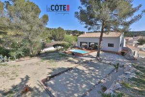 an aerial view of a house with a swimming pool at Villa Concept in Ensuès-la-Redonne