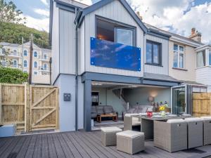 a house with a large window and a patio at 3 Bed in Bideford oc-78796 in Northam