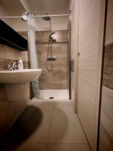 a bathroom with a sink and a shower at Lissy Casa Vacanze in Lamezia Terme