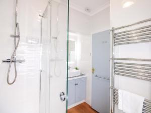 a bathroom with a shower and a sink at 4 The Elms in Salcombe +16 photos