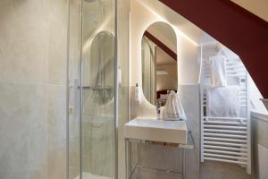 a bathroom with a sink and a shower at Best Western Plus Hotel Villa D'est in Strasbourg +36 photos