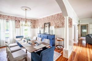 a dining room with a table and chairs at Mystic Landing in Kennebunk