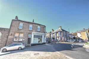 a car parked in front of a brick building at 2 Bed in Richmond oc-ds187 in Richmond