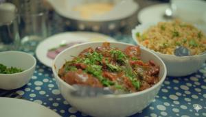 a table topped with bowls of food on a table at Mountain Golden Ray in Mukteshwar +42 photos