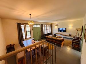 a living room with a couch and a table at City Retreat Mega in Arusha