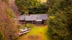 an aerial view of a house in the woods at Meular Room One in Castro