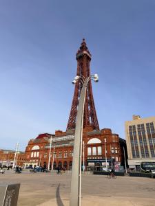 a eiffel tower in front of a building at Melrose Hotel in Blackpool