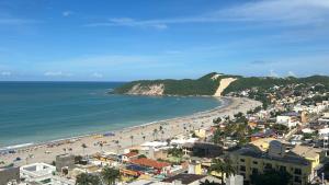 a view of a beach with a group of people at Natal Plaza Hotel in Natal