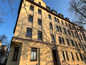 a large building with a tower on the side of it at FeWo Blick zum Lulatsch in Chemnitz
