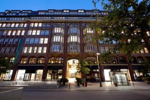 a large building with a lot of windows at Conrad Hamburg in Hamburg