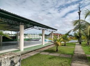 a view of a building with palm trees at Aeroporto Manaus in Manaus