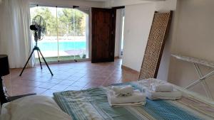 a room with a bed with towels on top of it at Villa Sakura in Kyrenia +33 photos