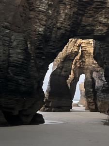 a group of rock formations on the beach at Casal de pelaio in Barreiros