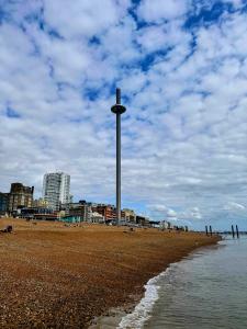 a pole on a beach next to the water at The Brighton Hotel Seafront in Brighton & Hove +38 photos