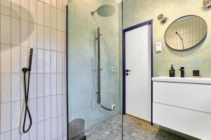 a bathroom with a shower and a sink at O'Hara in Horní Blatná