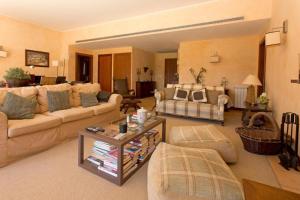 a living room with a couch and a table at GuestReady - Tranquillity in Baião in Baião
