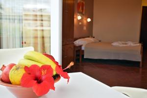 A bed or beds in a room at Iolkos Hotel Apartments