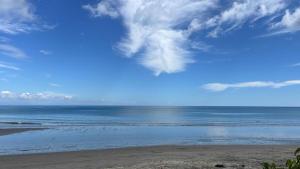 a view of the ocean from a beach at Burica Camping in Puerto Armuelles