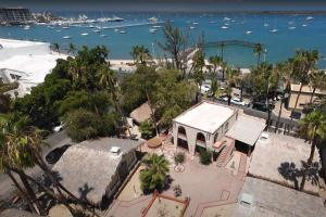 an aerial view of a building and a beach at Sandy Shores Cabaña 5 in La Paz