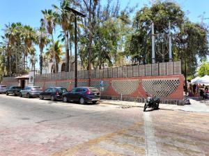 a motorcycle parked on the side of a street at Sandy Shores Cabaña 8 in La Paz
