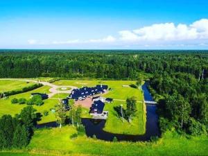 an aerial view of a park next to a river at Villa Nõva külalistemaja saunaga in Vaisi