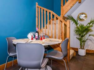 a dining room with a table and chairs at The Green in Ripon