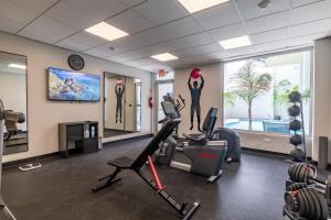 a fitness room with a gym with exercise equipment at TRYP by Wyndham Mayaguez in Mayaguez