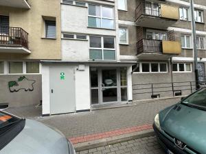 a building with a white door in front of it at InCentrum Pańska 3 in Warsaw