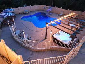an overhead view of a swimming pool at night at Splash Mountain in Oakhurst