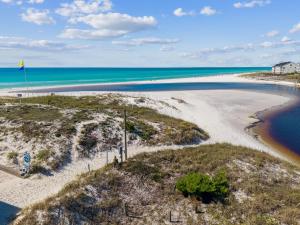 an aerial view of a beach with the ocean at Dock N Dune by 30A Escapes in Seagrove Beach