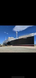 a large ship is sitting on the ground at Hôtel de la Mer - Barcarès, à 100 m de la plage in Le Barcarès +23 photos